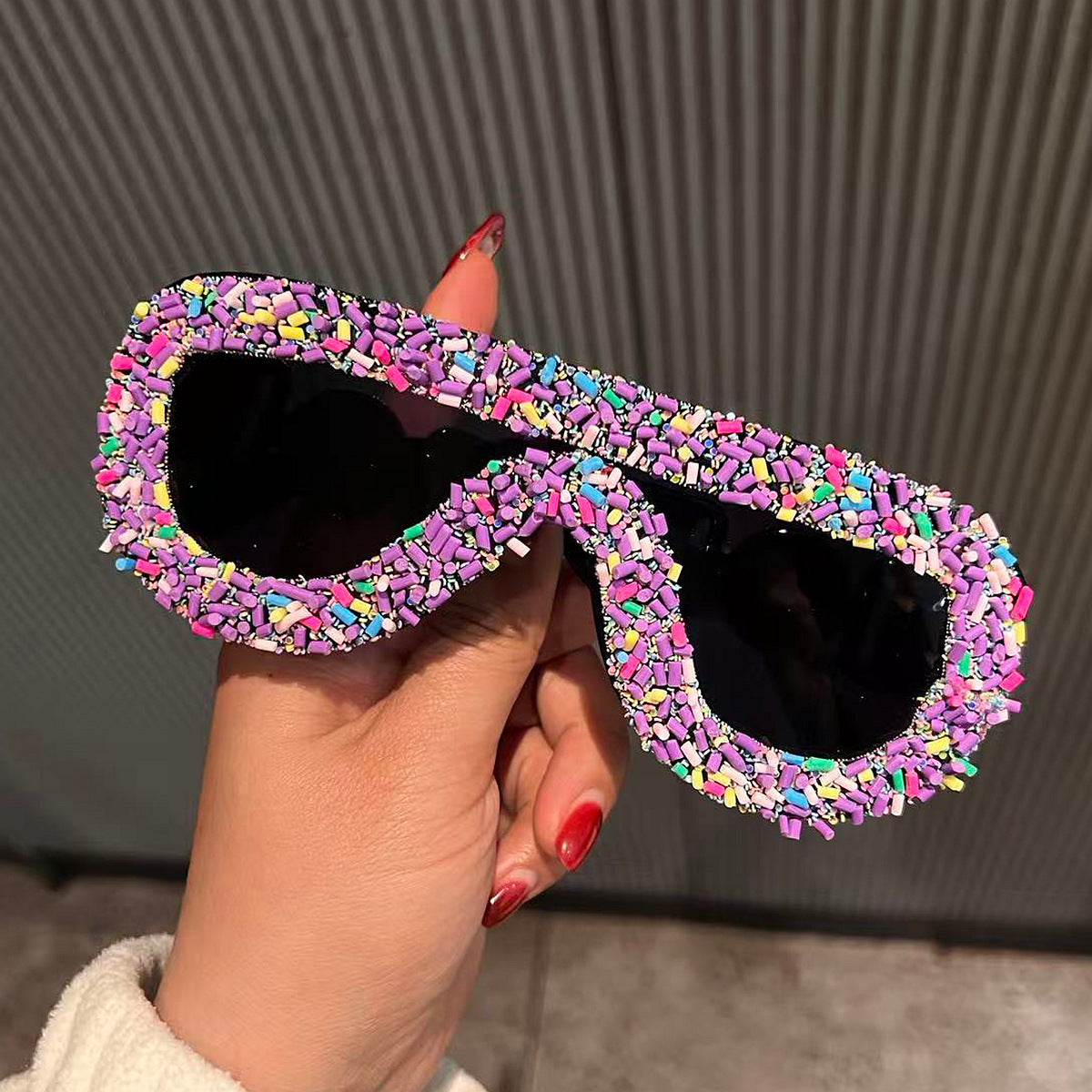 Damen trendige Sonnenbrille mit kreativem Zuckerguss-Design Karnz