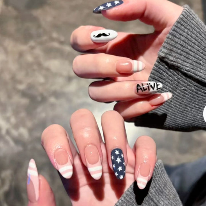 Themenbezogene grafische Nageldesigns Karnz