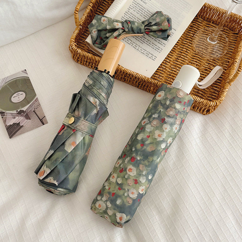 Damen Faltbarer Regenschirm mit floralem Design Karnz