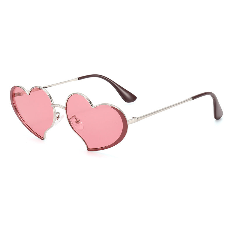 Damen Herzförmige Sonnenbrille mit glamourösem Rahmen Karnz