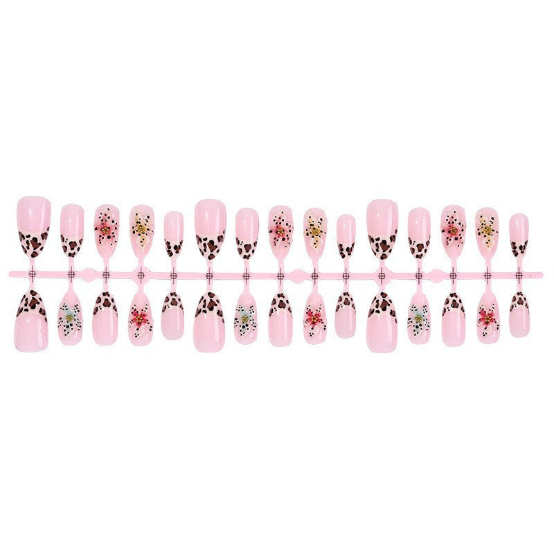 Exquisite Kunstnagel-Set mit floralem und tierischem Design Karnz