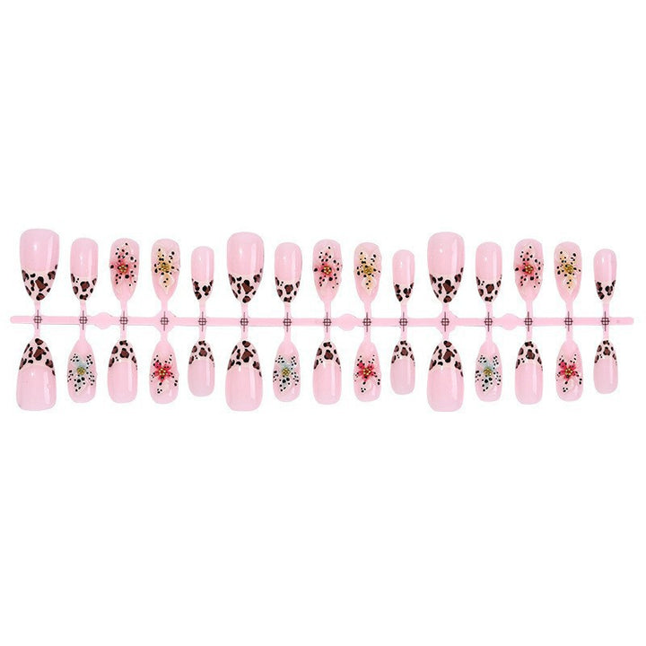 Exquisite Kunstnagel-Set mit floralem und tierischem Design Karnz