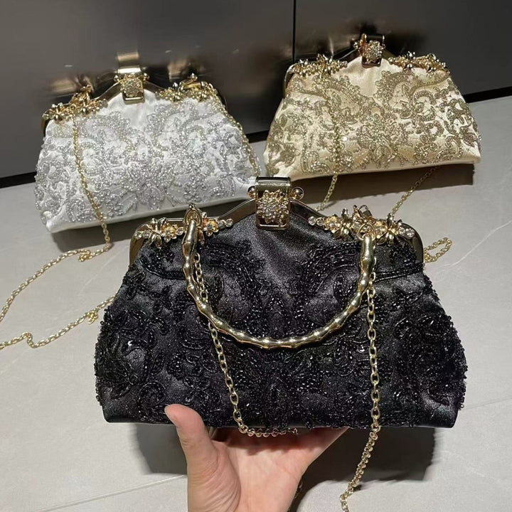 Bestickete Abendhandtasche