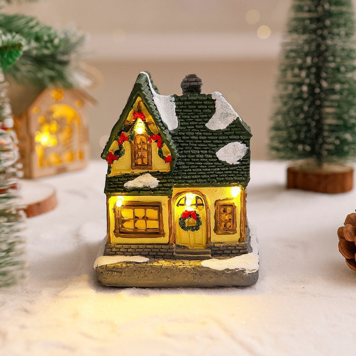 Dekoratives Weihnachtsdorf mit Lichtern Karnz