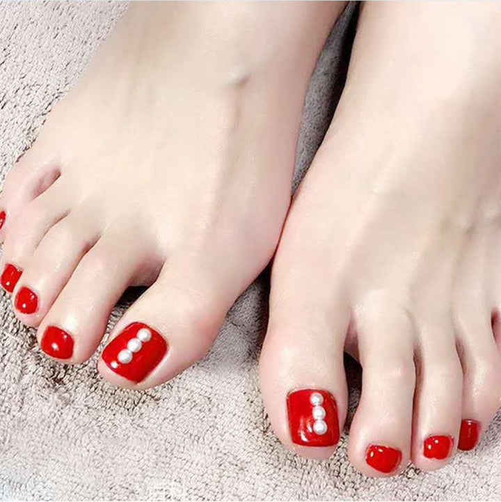 Glitzernde French Tip Zehennagelkunst