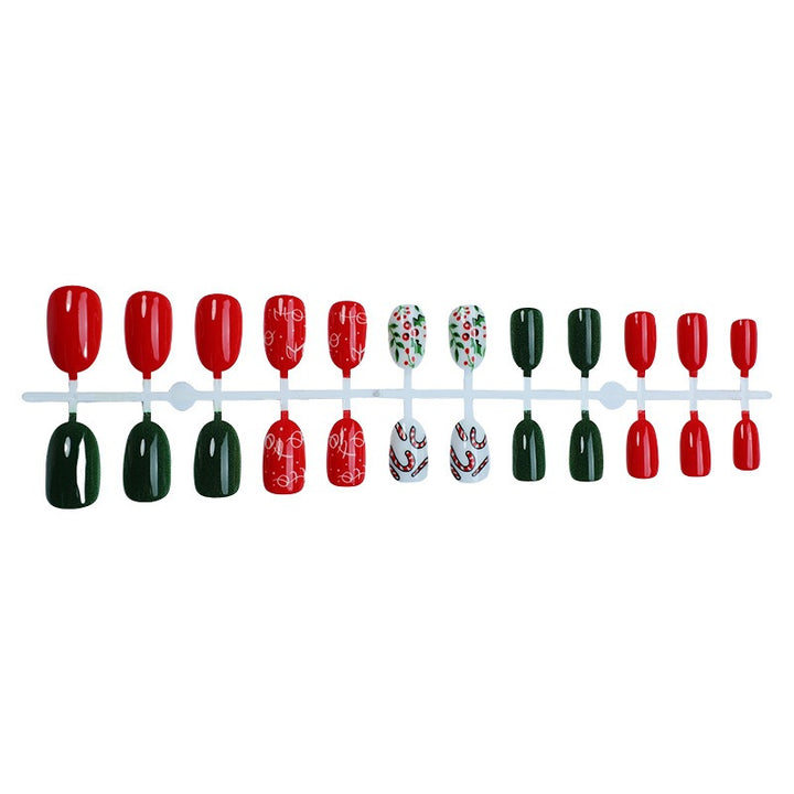 Weihnachts Kunstnagelset mit festlichen Motiven und Glitzerakzenten Karnz