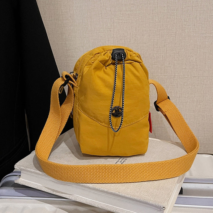 WoCompact Drawstring Crossbody Bag Karnz