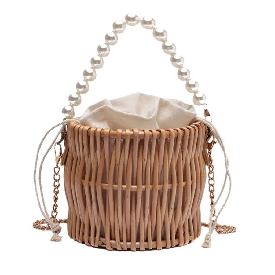 Damen Handtasche mit elegantem Perlengriff und geflochtenem Design Karnz