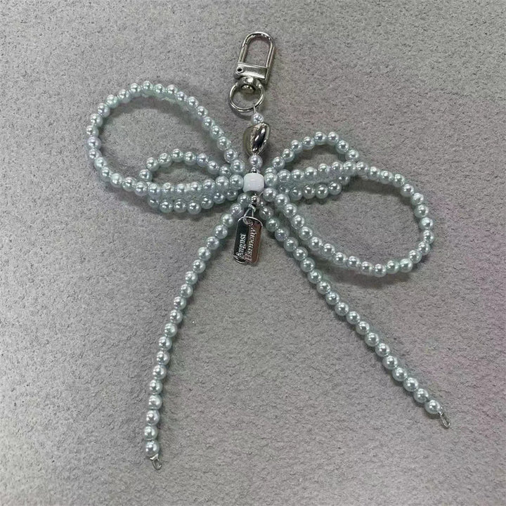 Elegante Perlenbogen Schlüsselanhänger Karnz