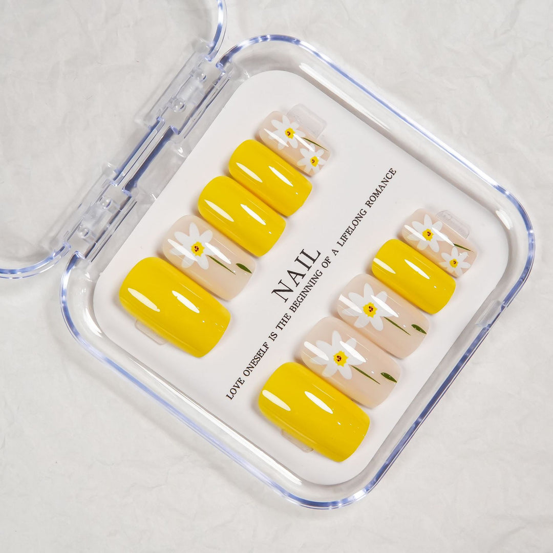 Floral Press-On Nagelset mit gelbem Akzent