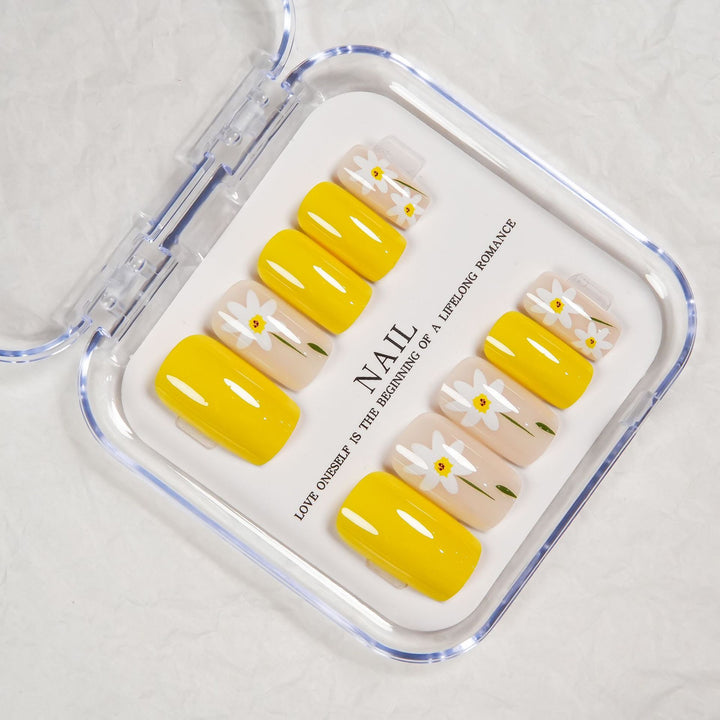 Floral Press-On Nagelset mit gelbem Akzent