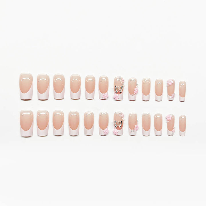 Kunstnagelset mit verspielten 3D-Blüten und Glitzerakzenten Karnz
