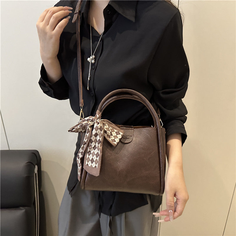 Elegante Schleifenakzent-Handtasche Karnz