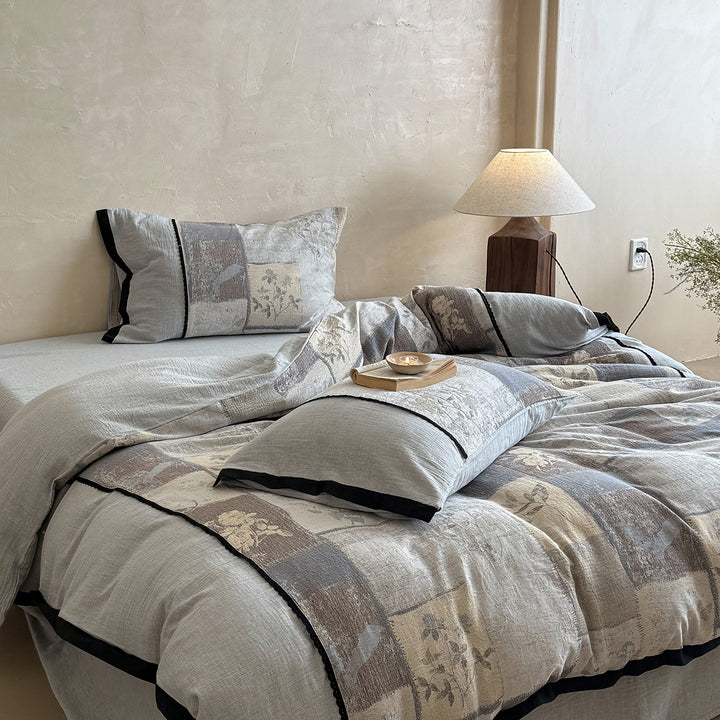 Umkehrbare Patchwork Leinen Baumwolle Bettbezug Set mit floralem Blockdruck und gepflanztem Rand