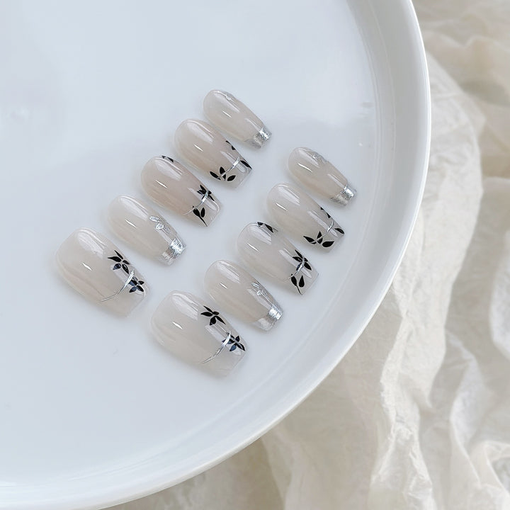 Künstlerisches Floral Press-On Nagelset mit glänzendem Finish