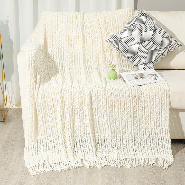 Strukturierte Strickwurfdecke