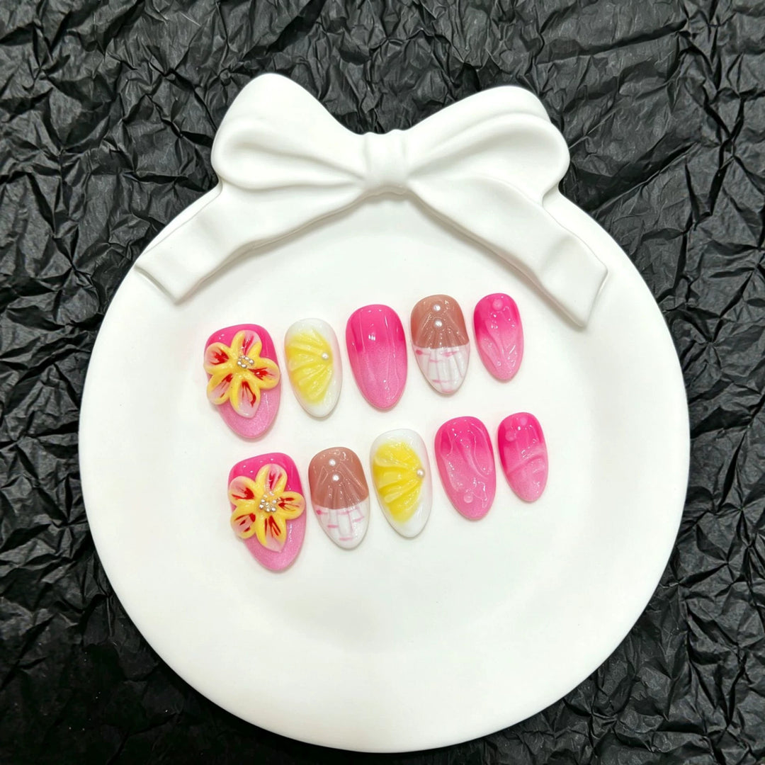 Dekorativer Press-On-Nagelsatz mit floralem und Ombré-Design