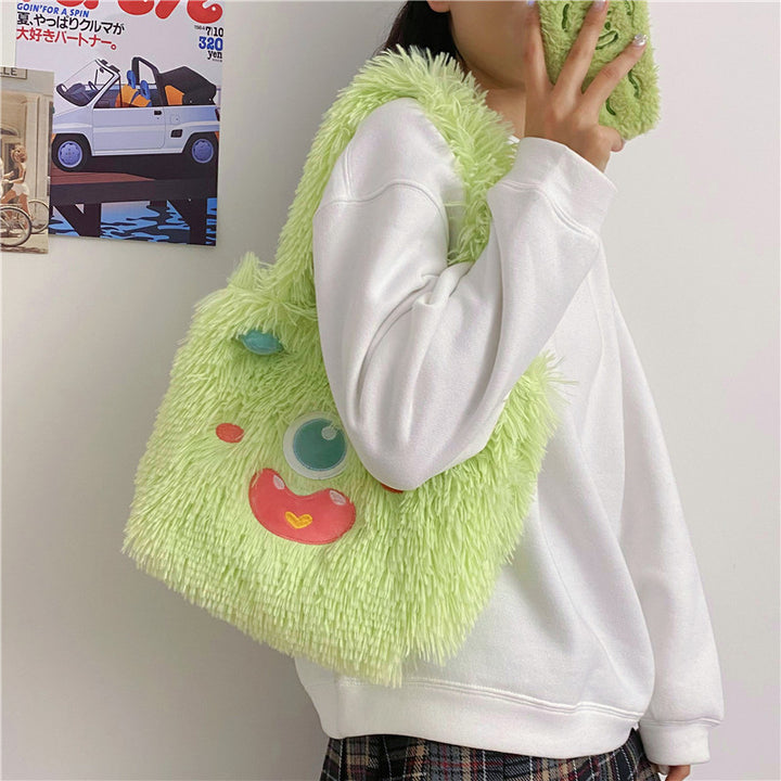 Verspielte Monster Plüschtasche