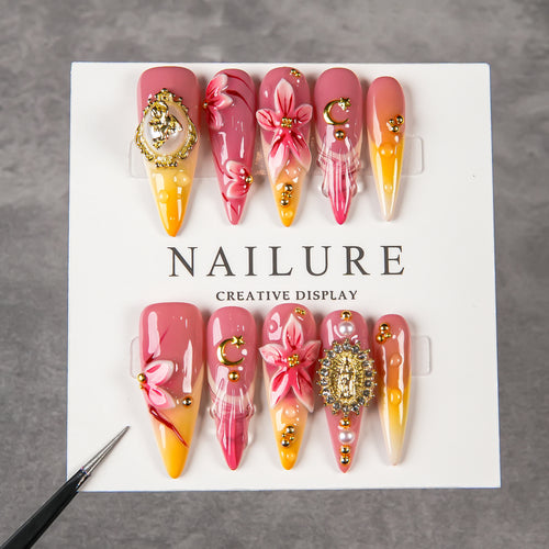 Künstlerisches Stiletto Press-On Nail Set mit floralen und Juwel-Akzenten