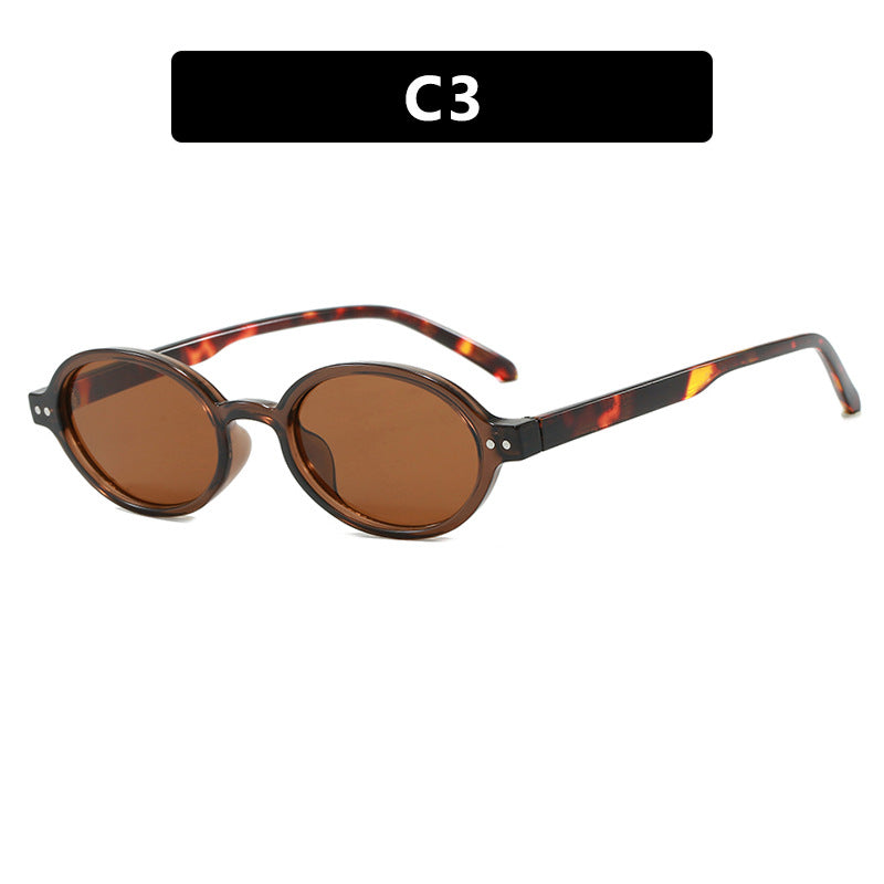 Damen modische ovalförmige Sonnenbrille mit ausgefallenem Rahmen Karnz