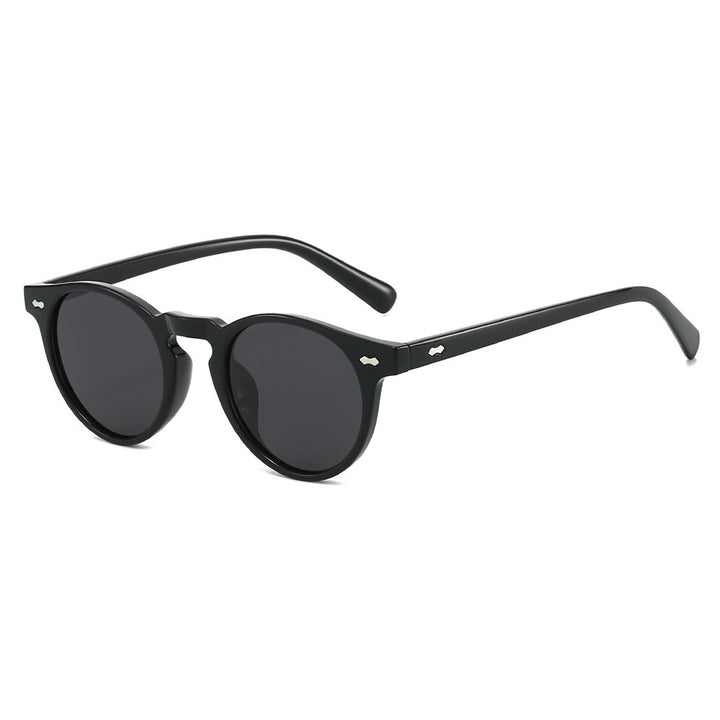 Damen Vintage Sonnenbrille mit runden Gläsern und transparentem Rahmen Karnz