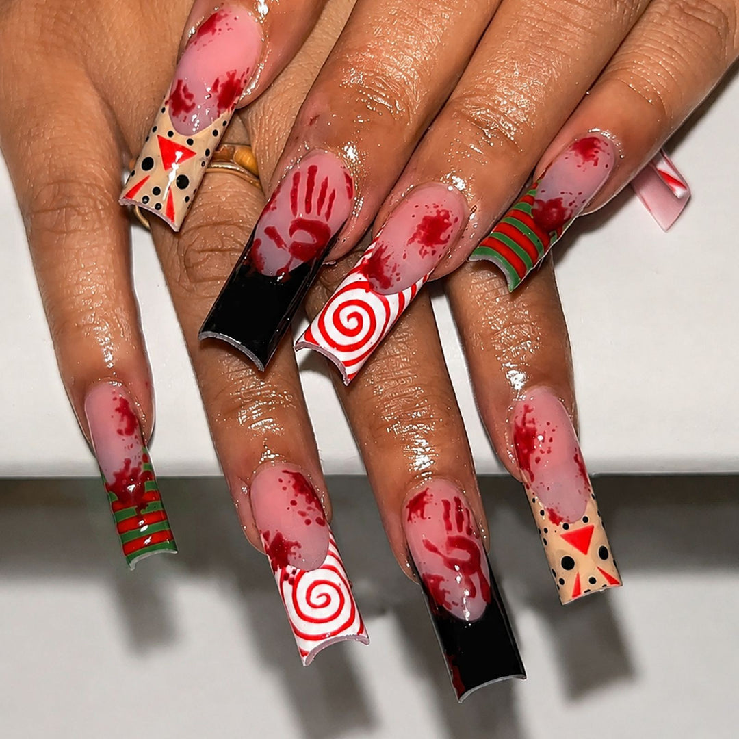 Kreatives Halloween Kunstnagelset mit skurrilen Motiven Karnz