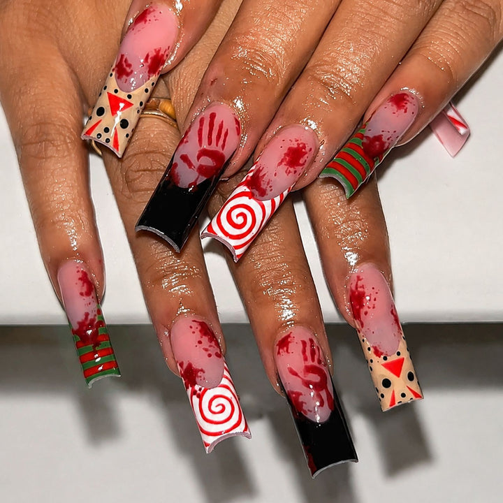 Kreatives Halloween Kunstnagelset mit skurrilen Motiven Karnz