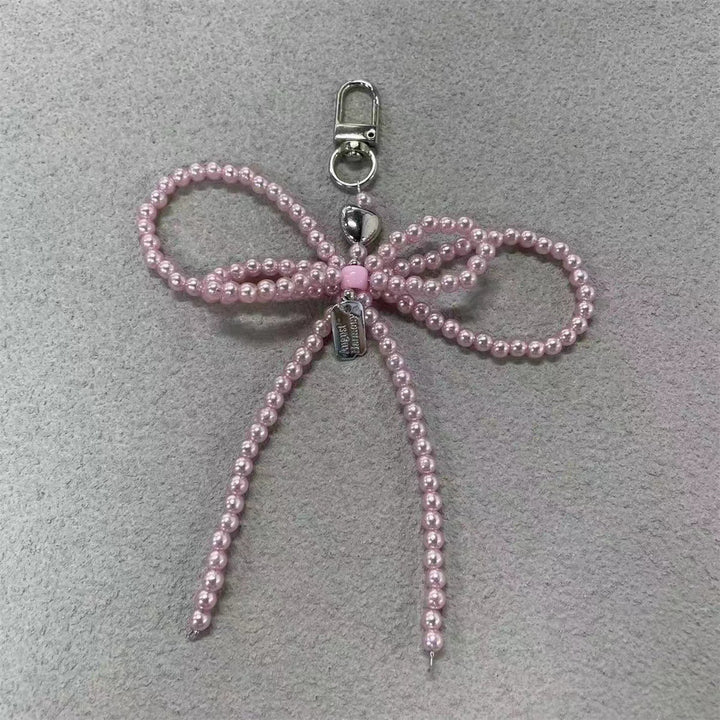 Elegante Perlenbogen Schlüsselanhänger Karnz