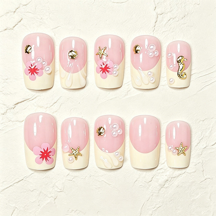 Tropische Muschel- und Blumen-Press-On-Nagelkunst Karnz
