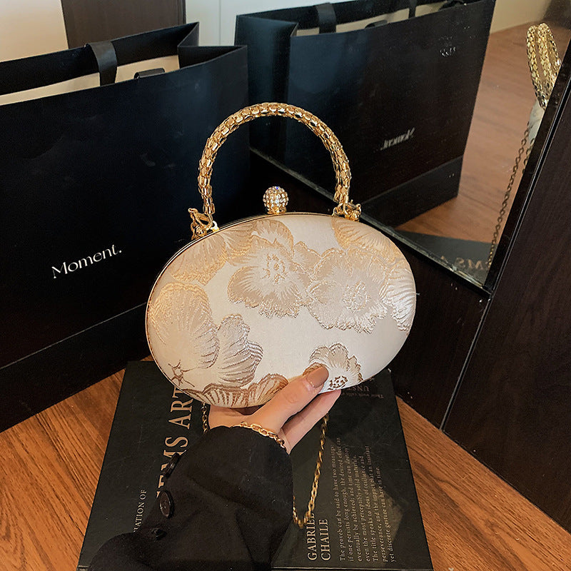 Elegante Blumen Abendtasche Karnz