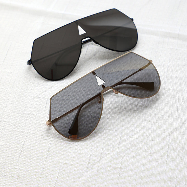 Damen futuristische Oversized-Sonnenbrille mit schützendem Metallrahmen Karnz