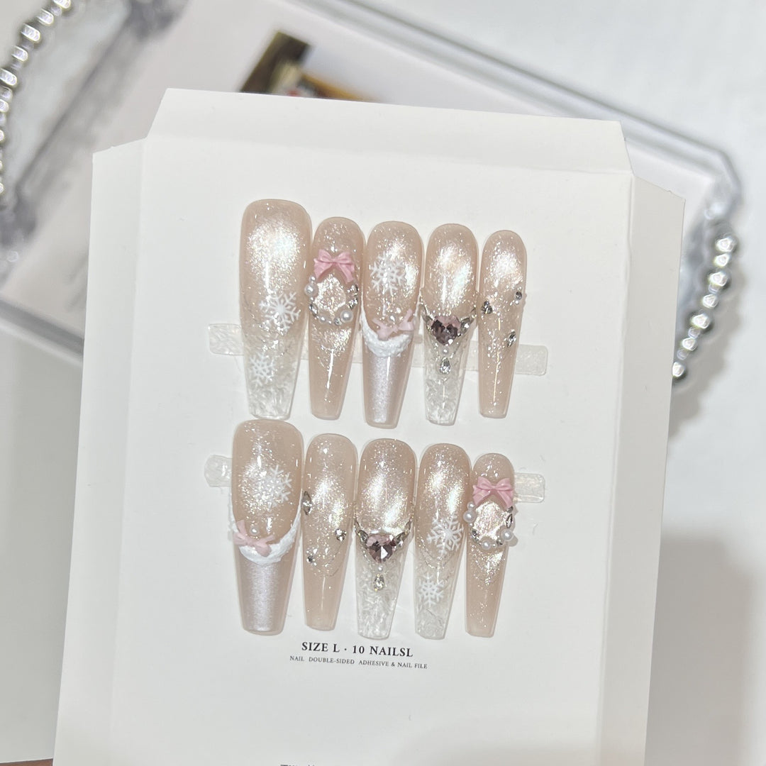 Dekorativer Stiletto Press-On Nagelset mit Strass- und Glitzerakzenten Karnz
