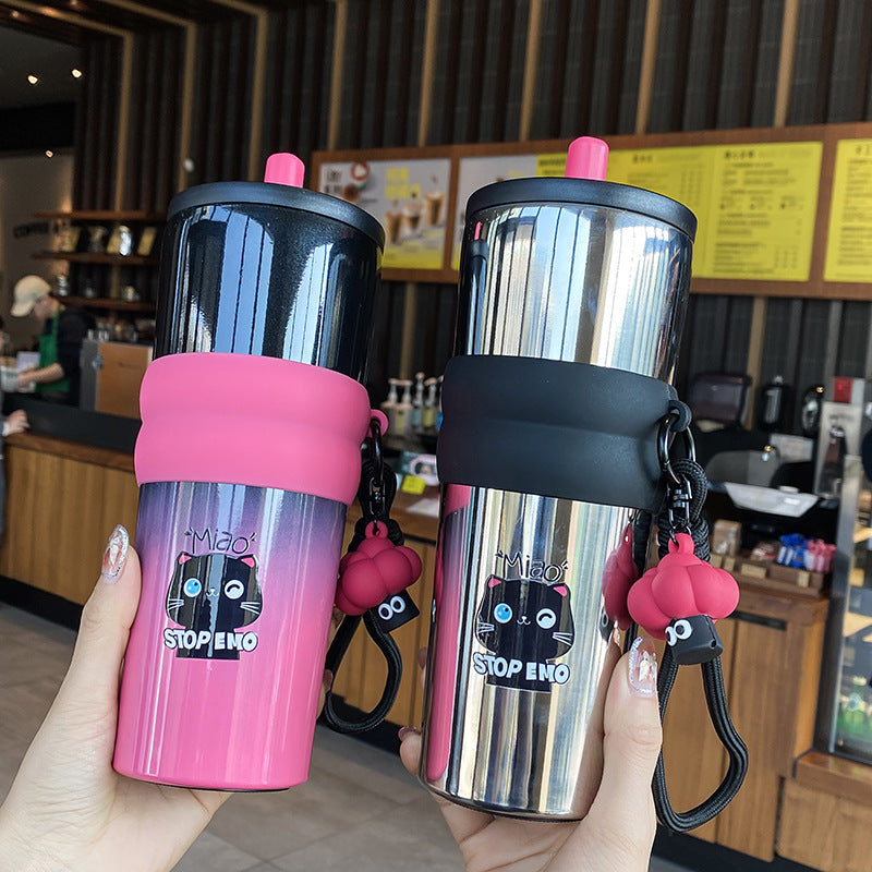 Damen verspielter Kaffeebecher mit Silikonhülle und integriertem Anhänger Karnz