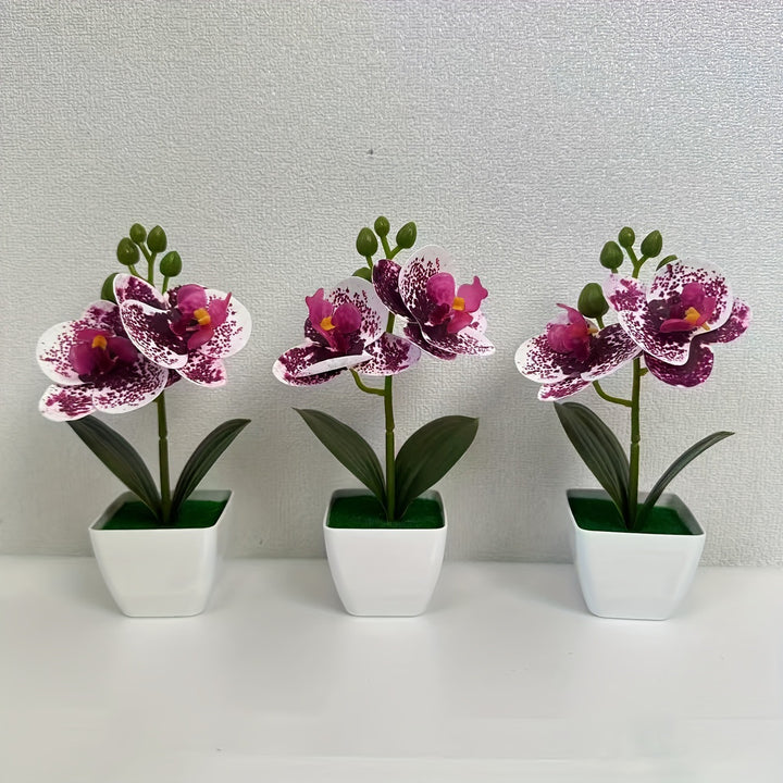 Dekorative künstliche Orchideenarrangement für die Wohnkultur展示