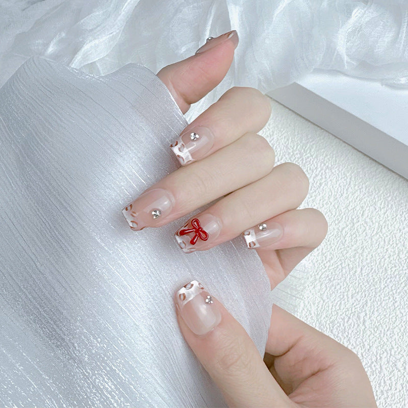 Elegante französische Tip Press-On Nägel Karnz