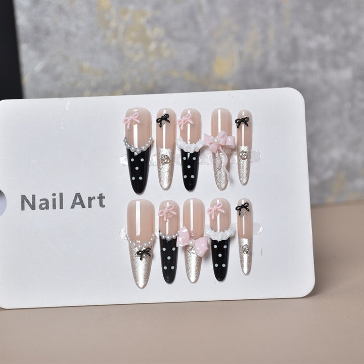 Dekoratives thematisches Acryldesign Press-On Nagelset Karnz