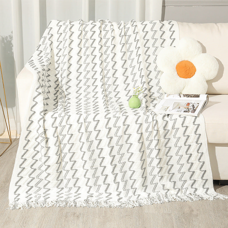 Gemütliche Strickwurfdecke