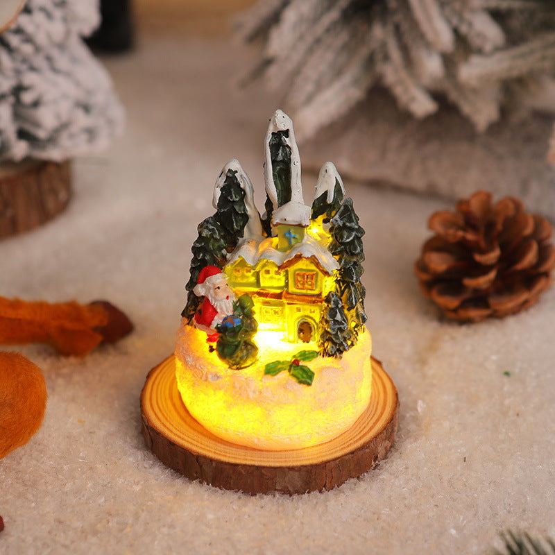 Weihnachtliche Miniaturbeleuchtung mit Schneeszenen Karnz