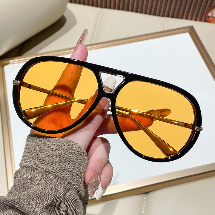 Damen Sonnenbrille im extravagantem Design mit markanten Gläsern Karnz