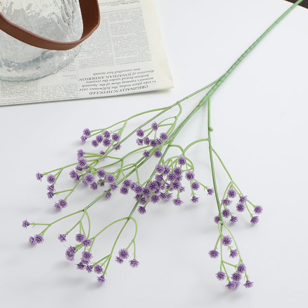Dekorativer Kunstblütenzweig mit feinen lila Blüten Karnz