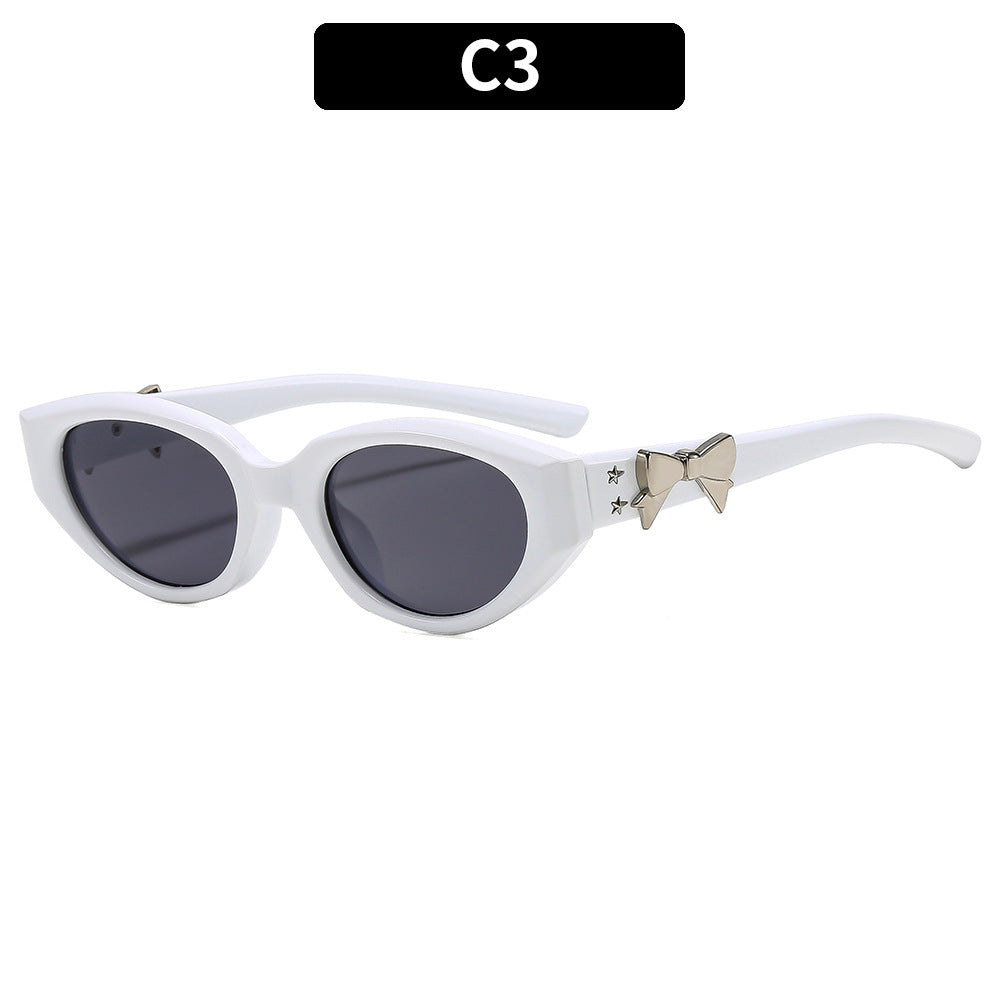 Elegante Katzenaugen-Sonnenbrille mit dekorativem Bogen