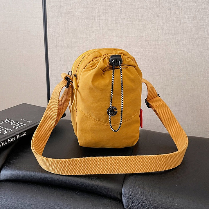 WoCompact Drawstring Crossbody Bag Karnz