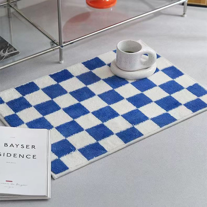 Schwarzweiß kariertes Badevorleger