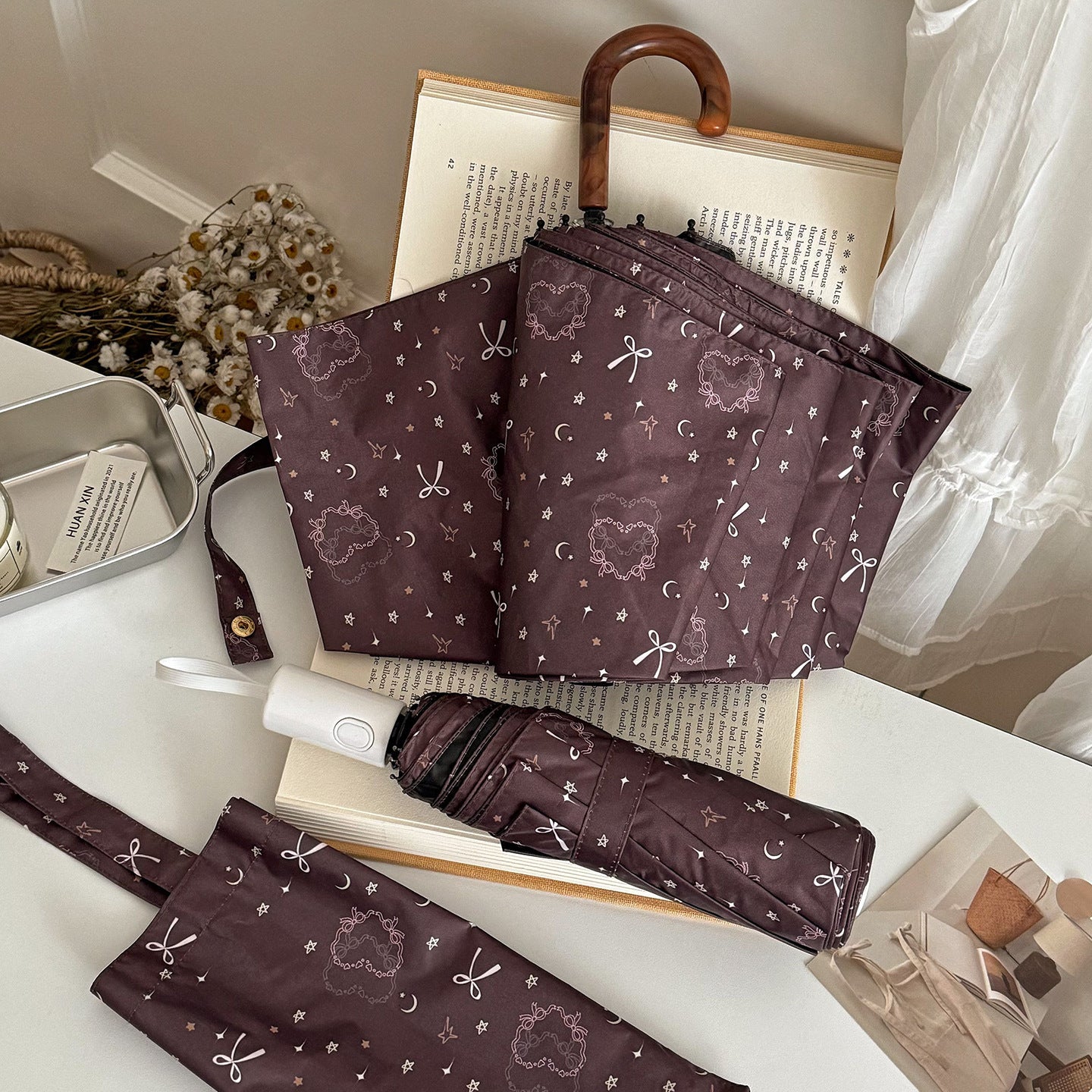 Damen Faltregenschirm mit elegantem Anhängerdesign Karnz