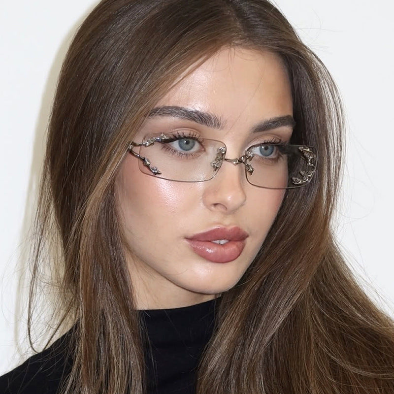 Damen modische Sonnenbrille mit filigranem Metallrahmen und transparenten Gläsern Karnz