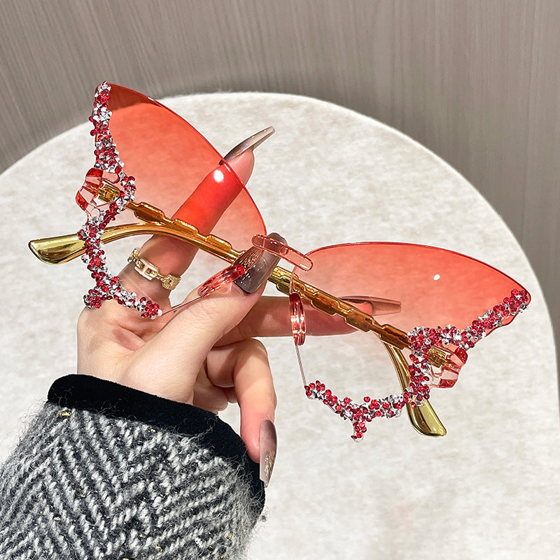 Damen extravagante Sonnenbrille mit Kristallverzierungen Karnz
