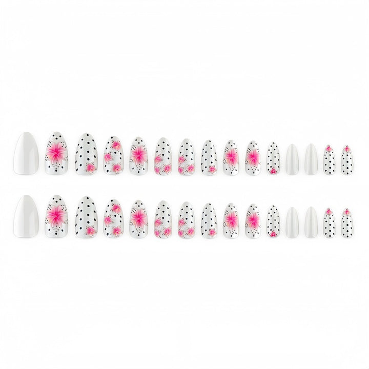 Kunstnagelset mit floralen Akzenten und Polka-Dots Karnz