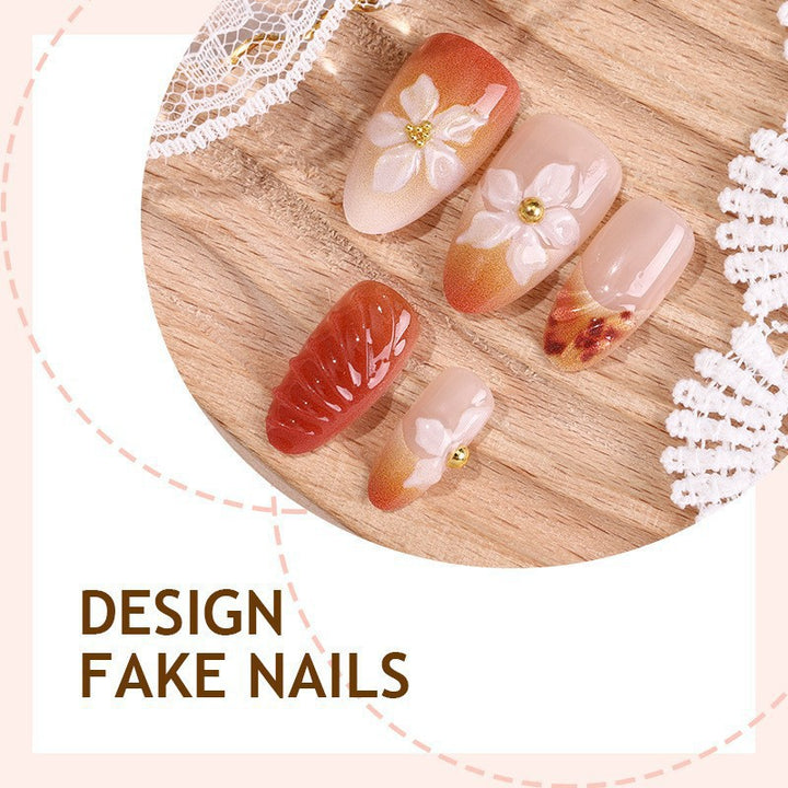 Kunstnagelset mit handgefertigten Blüten- und Eleganten Verzierungen Karnz