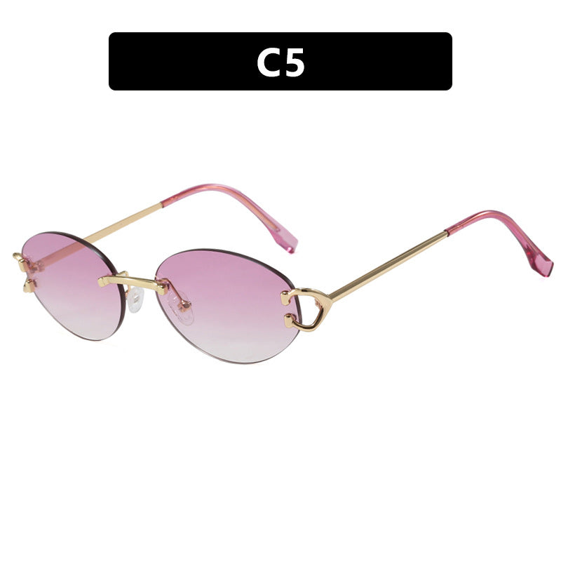 Damen elegante ovalförmige Sonnenbrille mit modischem Metallrahmen Karnz