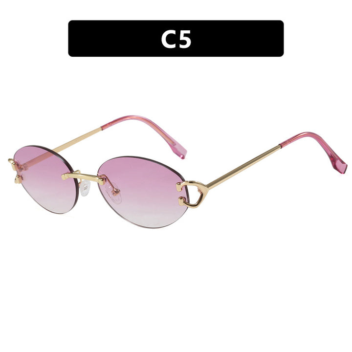 Damen elegante ovalförmige Sonnenbrille mit modischem Metallrahmen Karnz
